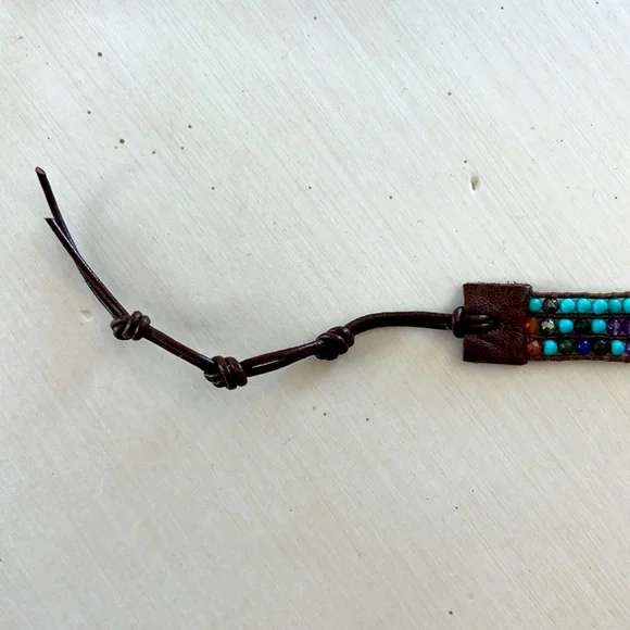 Multicolored gemstone leather wrap bracelet.